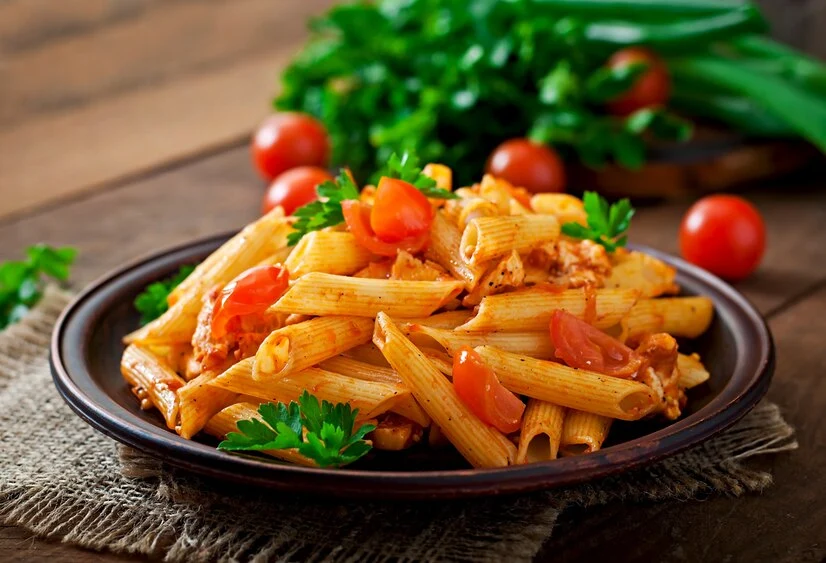 penne pasta tomato sauce with chicken tomatoes wooden table 2829 19739 1